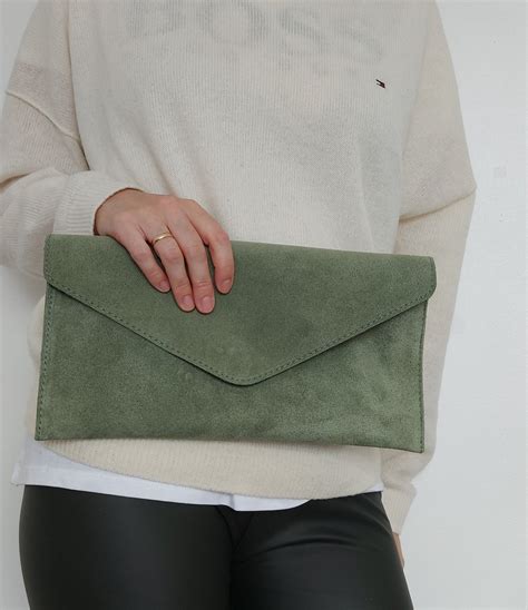 sage green clutch bag.